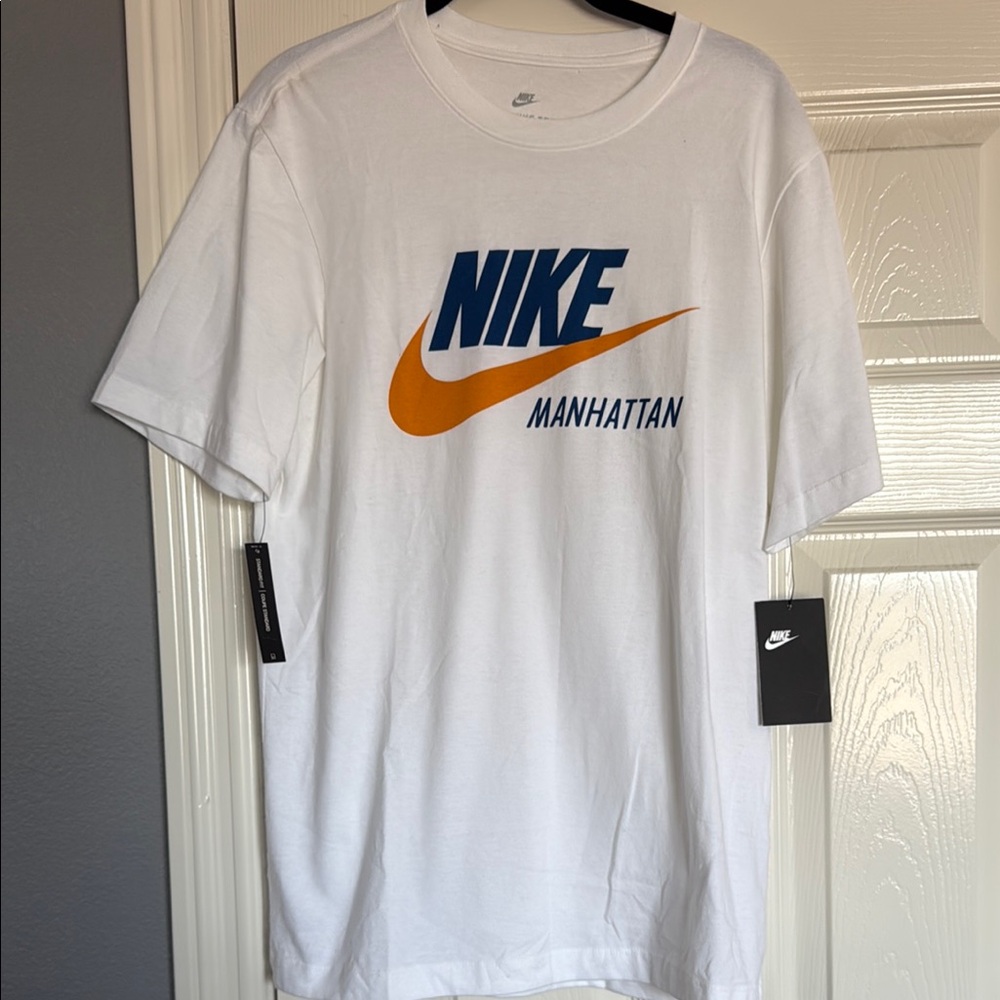 The Nike Tee White Manhattan with Blue and Orange Logo